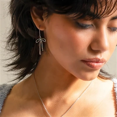 Boucles d'oreilles nœud papillon pour le style estival